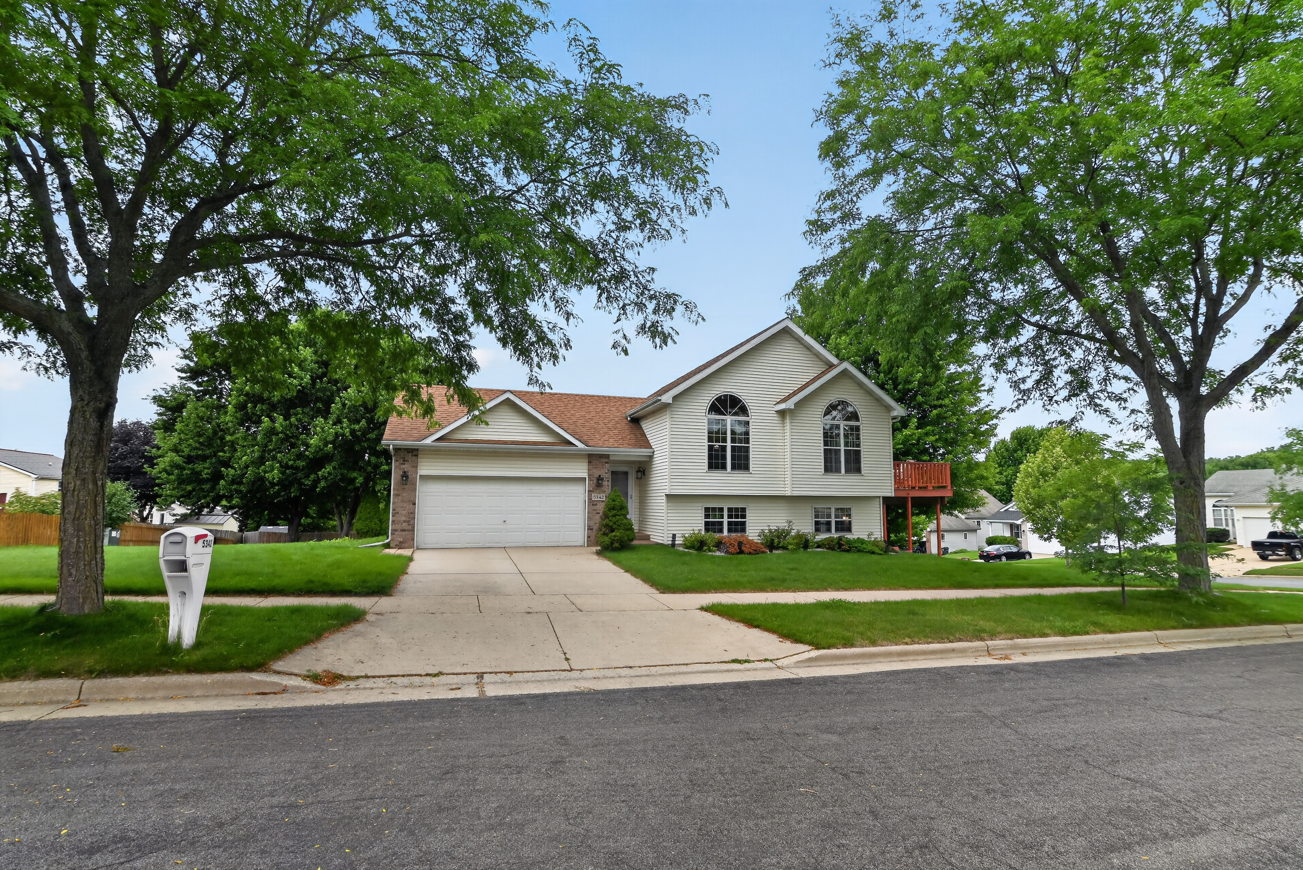 Front exterior of 5342 Tree Ridge Trail in Madison